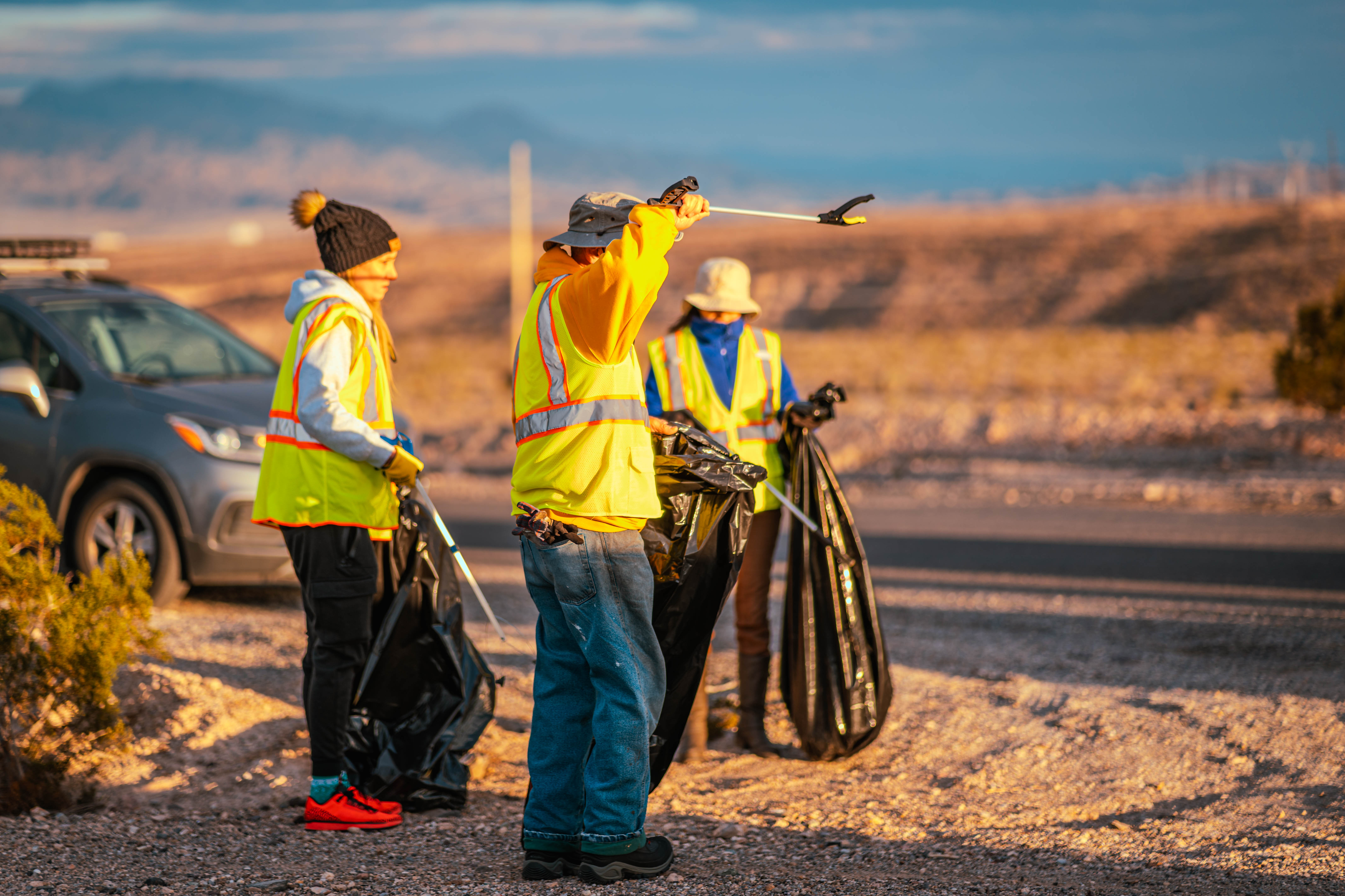 Volunteers clean up trash during annual cleanup event at Silvercreek Rd