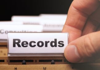 alt="folder with "records" label"