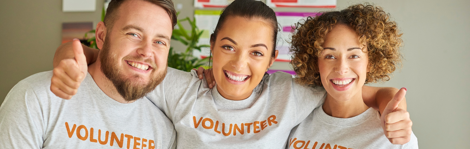 "Happy volunteers taking a photo "