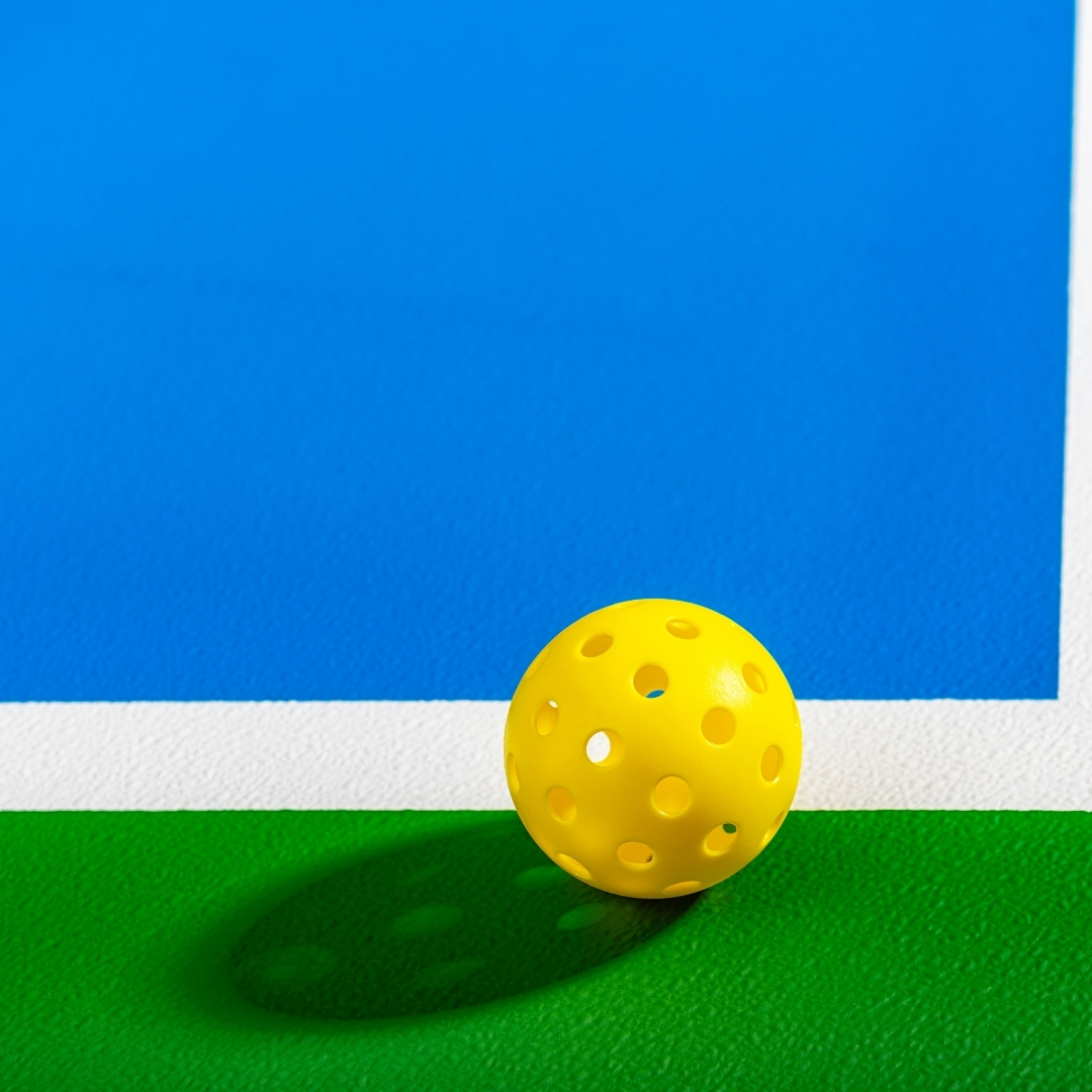 a pickleball on a court