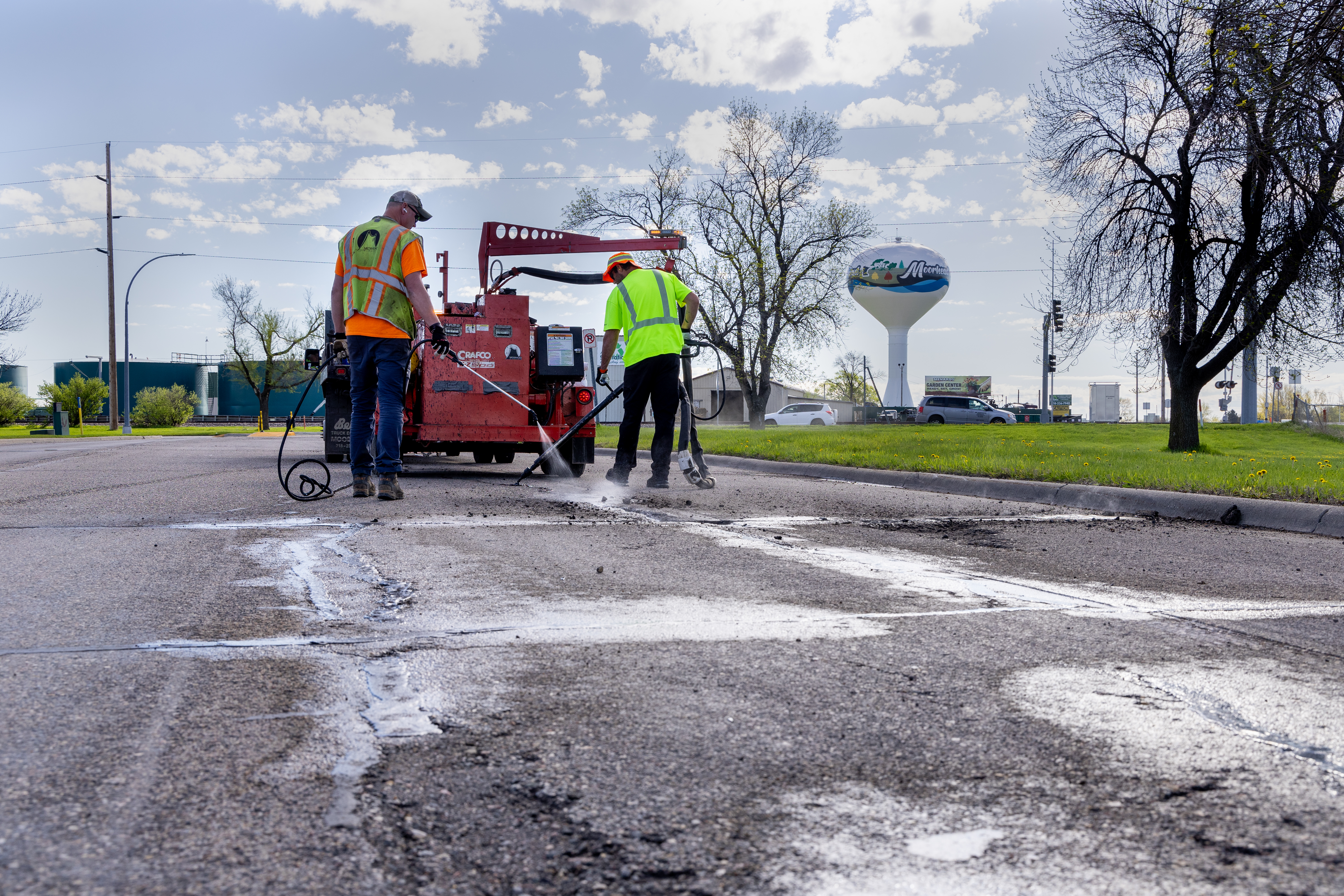 City workers repairing road