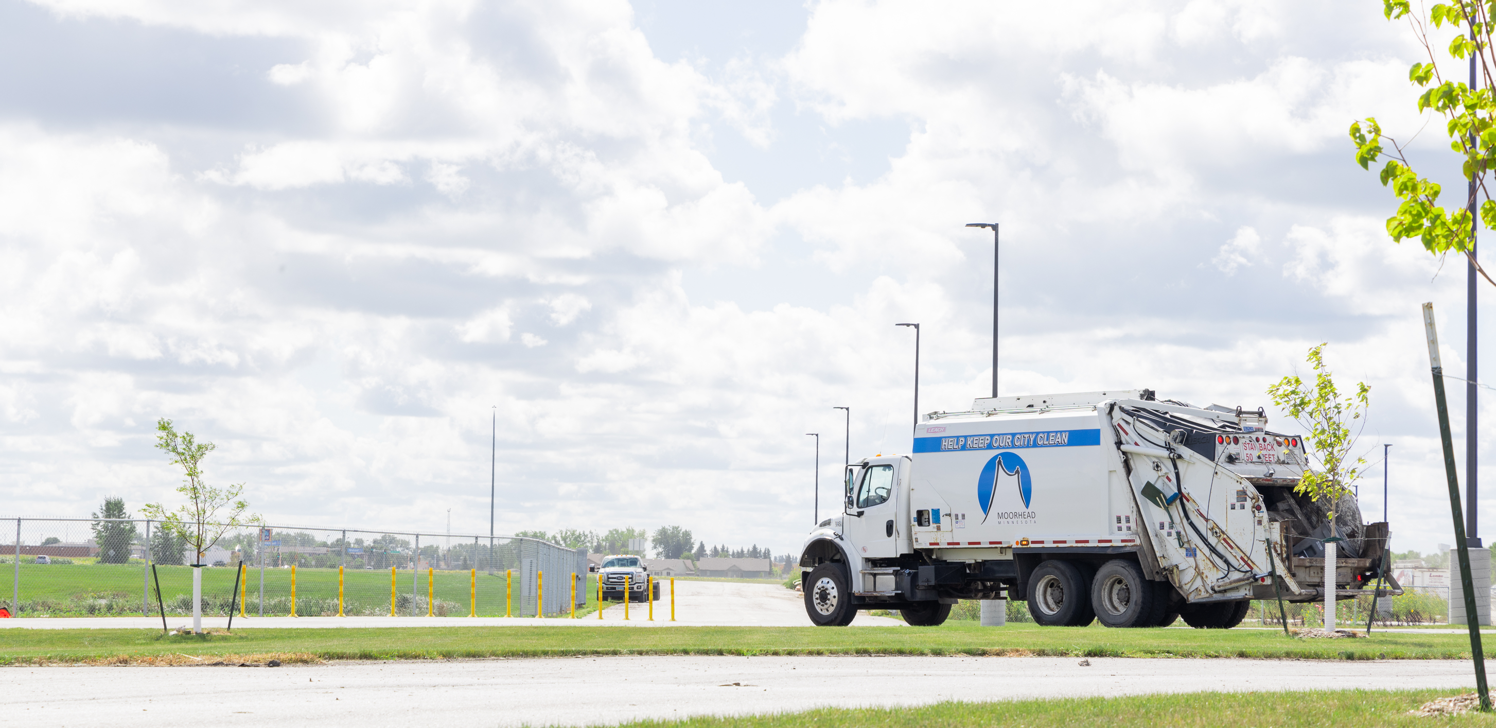 Garbage truck on a park road